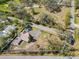 Aerial view of property highlighting home, surrounding landscape, and spacious lot at 7018 13Th E Ave, Bradenton, FL 34208