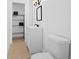 Cozy bathroom with stylish vanity, storage shelves and tiled floor at 7018 13Th E Ave, Bradenton, FL 34208