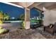 A well-manicured front yard with a stone driveway and colorful landscaping at 7928 Redonda Loop, Bradenton, FL 34202