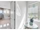 Bright main bathroom with natural light, elegant fixtures, and modern design elements at 7928 Redonda Loop, Bradenton, FL 34202