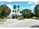 Edgewater Village gatehouse with palm trees and manicured landscaping at 8215 Waterview Blvd, Lakewood Ranch, FL 34202