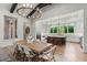 Open dining room with an expansive view of the adjacent kitchen, perfect for entertaining and Gathering gatherings at 8455 Lindrick Ln, Bradenton, FL 34202