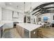 Well-designed kitchen flows into the dining and living areas, enhancing the home's open and inviting atmosphere at 8455 Lindrick Ln, Bradenton, FL 34202