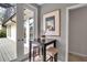 Dining area featuring a table with seating for two, art, and views of the outdoors at 980 S Orange Ave, Sarasota, FL 34236
