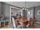 Dining room featuring hardwood floors and open access to the kitchen at 980 S Orange Ave, Sarasota, FL 34236