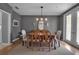 Dining room featuring wooden table and seating for eight people at 980 S Orange Ave, Sarasota, FL 34236