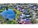 Aerial view of the house featuring a pool, patio, and scenic backyard at 9818 Old Hyde Park Pl, Bradenton, FL 34202