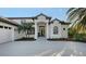 Beautiful exterior showcasing meticulous landscaping, manicured lawn and a well-maintained home at 9818 Old Hyde Park Pl, Bradenton, FL 34202