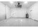 Large garage area with dual doors and finished flooring at 10 Mast Dr # 1, Placida, FL 33946