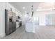 Modern kitchen with stainless steel appliances, a center island and an open floorplan at 10 Mast Dr # 1, Placida, FL 33946