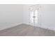 Office featuring gray wood-look vinyl plank flooring and white french doors at 10 Mast Dr # 1, Placida, FL 33946