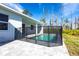 Backyard fenced pool area with patio is perfect for entertaining and enjoying sunny days at 10 Mast Dr # 1, Placida, FL 33946