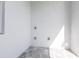 All-white room with hard surface flooring and baseboards at 10 Mast Dr # 1, Placida, FL 33946