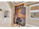 Custom kitchen with a desk, unique lighting, and a seamless flow into other areas of the home at 10494 Atenia St, Port Charlotte, FL 33981