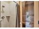 Tiled shower next to a wood paneled sauna at 10494 Atenia St, Port Charlotte, FL 33981
