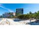 Beach across street from condominium buildings at 11 Sunset Dr # 303, Sarasota, FL 34236