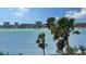 Coastal living showcasing beautiful water views, nearby buildings, and a boat on the ocean waters at 11 Sunset Dr # 303, Sarasota, FL 34236