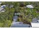 Aerial view of home surrounded by trees, highlighting privacy and neighborhood layout at 1231 S Orange Ave, Sarasota, FL 34239
