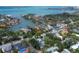 Stunning aerial view showcasing waterfront properties with access to bay and city skyline at 1231 S Orange Ave, Sarasota, FL 34239