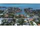 Gorgeous aerial view of a neighborhood with waterfront homes and beautiful waterway access at 1231 S Orange Ave, Sarasota, FL 34239