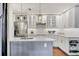 Contemporary kitchen with custom cabinets, sleek countertops, and pendant lighting at 1231 S Orange Ave, Sarasota, FL 34239
