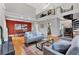 Spacious living room with an open floor plan with hardwood floors and staircase at 1231 S Orange Ave, Sarasota, FL 34239
