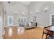 Bright living room with tall ceilings, hardwood floors, and a view to the front porch at 1231 S Orange Ave, Sarasota, FL 34239