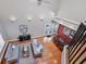 Open concept living room with high ceilings, hardwood floors, and a dining area at 1231 S Orange Ave, Sarasota, FL 34239