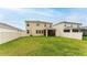 Lush backyard with a screened-in porch, enhanced by privacy fencing at 12534 Nantahala Run Run, Parrish, FL 34219