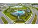Resort-style community pool nestled amongst lush greenery with nearby playground, picnic area, and clubhouse for recreation at 12534 Nantahala Run Run, Parrish, FL 34219