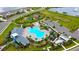 Community pool with ample seating, picnic tables, playground and clubhouse provides a resort-like experience for residents at 12534 Nantahala Run Run, Parrish, FL 34219