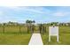 Dog park featuring grassy area and a central gate for access and security at 12534 Nantahala Run Run, Parrish, FL 34219