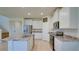 Modern kitchen with stainless steel appliances, granite countertops and an island with a sink at 12534 Nantahala Run Run, Parrish, FL 34219