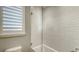 Bathroom features white subway tile, modern fixtures and natural light at 12707 Deacons Pl, Lakewood Ranch, FL 34202