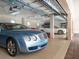 Spacious garage showcasing luxury vehicles and ample storage, ready for car enthusiasts at 1304 Casey Key Rd, Nokomis, FL 34275