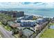 Stunning aerial view of beachside condo community with ocean views and resort-style amenities at 1465 Gulf Of Mexico Dr # 104, Longboat Key, FL 34228