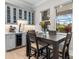 Cozy dining area with a custom wine fridge and an outdoor view at 1805 7Th St E, Palmetto, FL 34221