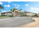 Stately community center featuring stone accents, lush landscaping, and a welcoming entrance at 1805 7Th St E, Palmetto, FL 34221