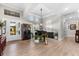 Elegant foyer features hardwood floors, neutral color palette, and ample lighting at 1805 7Th St E, Palmetto, FL 34221