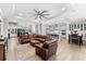 Open concept living features modern furnishings, hardwood floors, neutral color palette and lots of light at 1805 7Th St E, Palmetto, FL 34221