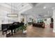 Spacious living room features elegant hardwood floors, neutral color palette and open concept living at 1805 7Th St E, Palmetto, FL 34221
