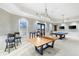 Community recreation room with a ping pong table, pool table and comfortable seating at 1805 7Th St E, Palmetto, FL 34221