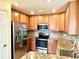 Well-equipped kitchen with stainless steel appliances and granite countertops at 20080 Ragazza Cir # 102, Venice, FL 34293