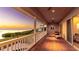 Covered balcony offering stunning views of the sunset and waterfront at 202 Gaines Ave, Sarasota, FL 34243