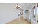 Bright dining room featuring a decorative chandelier and a view of the water at 202 Gaines Ave, Sarasota, FL 34243