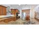 This kitchen has beautiful wood cabinets, granite countertops, and stainless steel appliances at 202 Gaines Ave, Sarasota, FL 34243