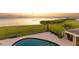 Beautiful pool view from the outdoor patio with relaxing water views and lush greenery at 202 Gaines Ave, Sarasota, FL 34243
