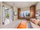Bonus room with built-in cabinets, lake views, and space for working or relaxing at 212 Haverkos Ct, Holmes Beach, FL 34217
