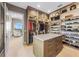 Large custom walk-in closet with tons of storage for shoes, handbags, and clothing at 212 Haverkos Ct, Holmes Beach, FL 34217