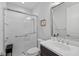 Clean bathroom featuring a glass enclosed shower, vanity with sink, and modern fixtures at 220 Cassano Dr, Nokomis, FL 34275